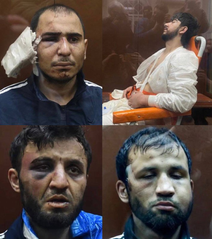 #isis 恐怖分子嫌犯出现在俄罗斯🇷🇺法院莫斯科🇷🇺法院已下令拘留四名嫌疑人，这是十多年来俄罗斯领土上规模最大的袭击事件，该国为这次袭击举行了一天的哀悼活动，造成137人死亡，180人受伤